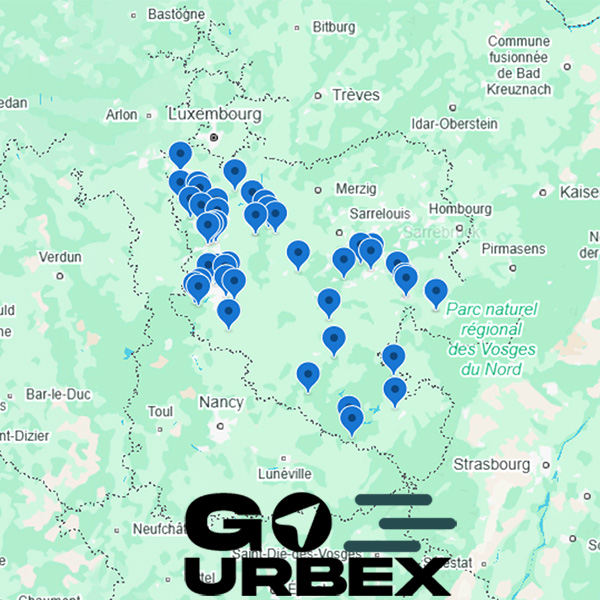 Carte urbex Moselle sur smartphone affichant 46 points GPS de lieux abandonnés industriels et militaires.